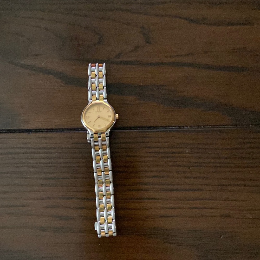 Omega Deville ladies watch in steel and 18k gold.  Quartz movement petite size